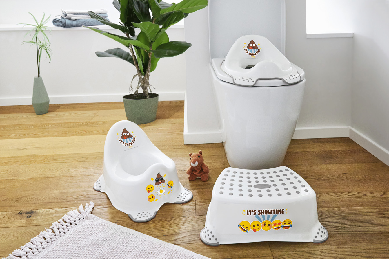 Emoji-themed potty training set with potty, toilet trainer, and step stool from keeeper.