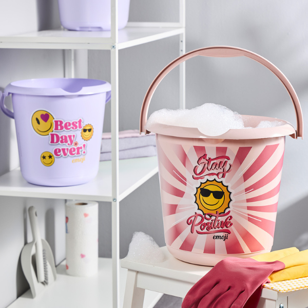 Plastic buckets with emoji designs, one filled with soap bubbles.
